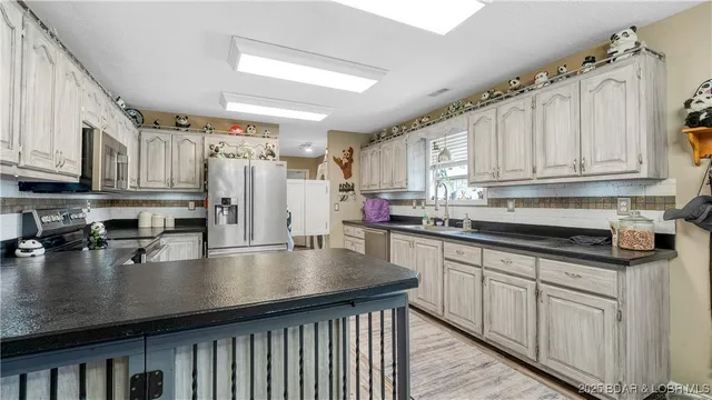 $589,900 | 312 Charger Drive, Macks Creek, MO 65786