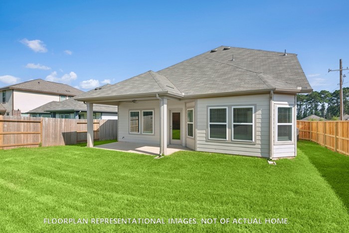 3407 Angus Farm Drive Rosenberg, TX 77471 - Photo 7 of 22 a view of a house with a yard and sitting area