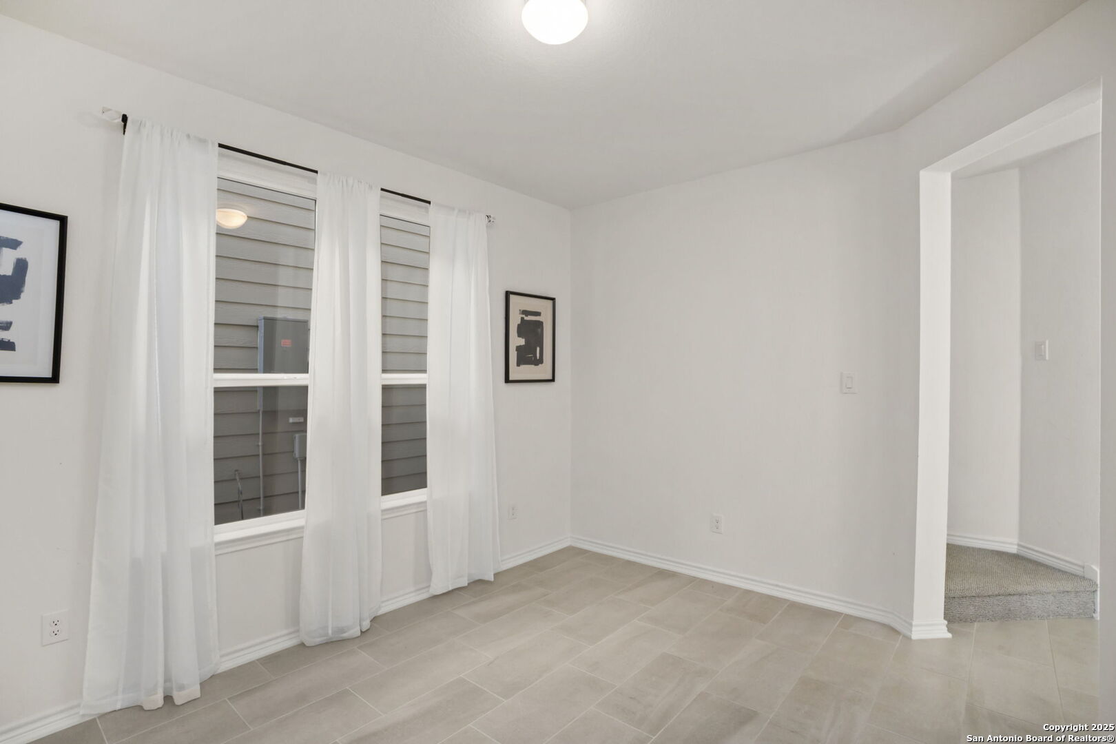 14839 Vance Jackson Road, Unit 508 San Antonio, TX 78249 - Photo 21 of 35 an empty room with windows