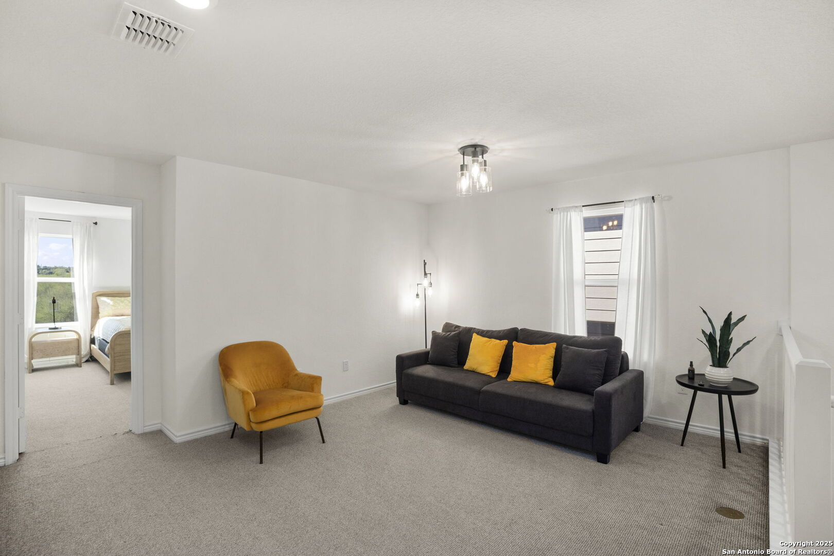 14839 Vance Jackson Road, Unit 508 San Antonio, TX 78249 - Photo 25 of 35 a living room with furniture and a lamp