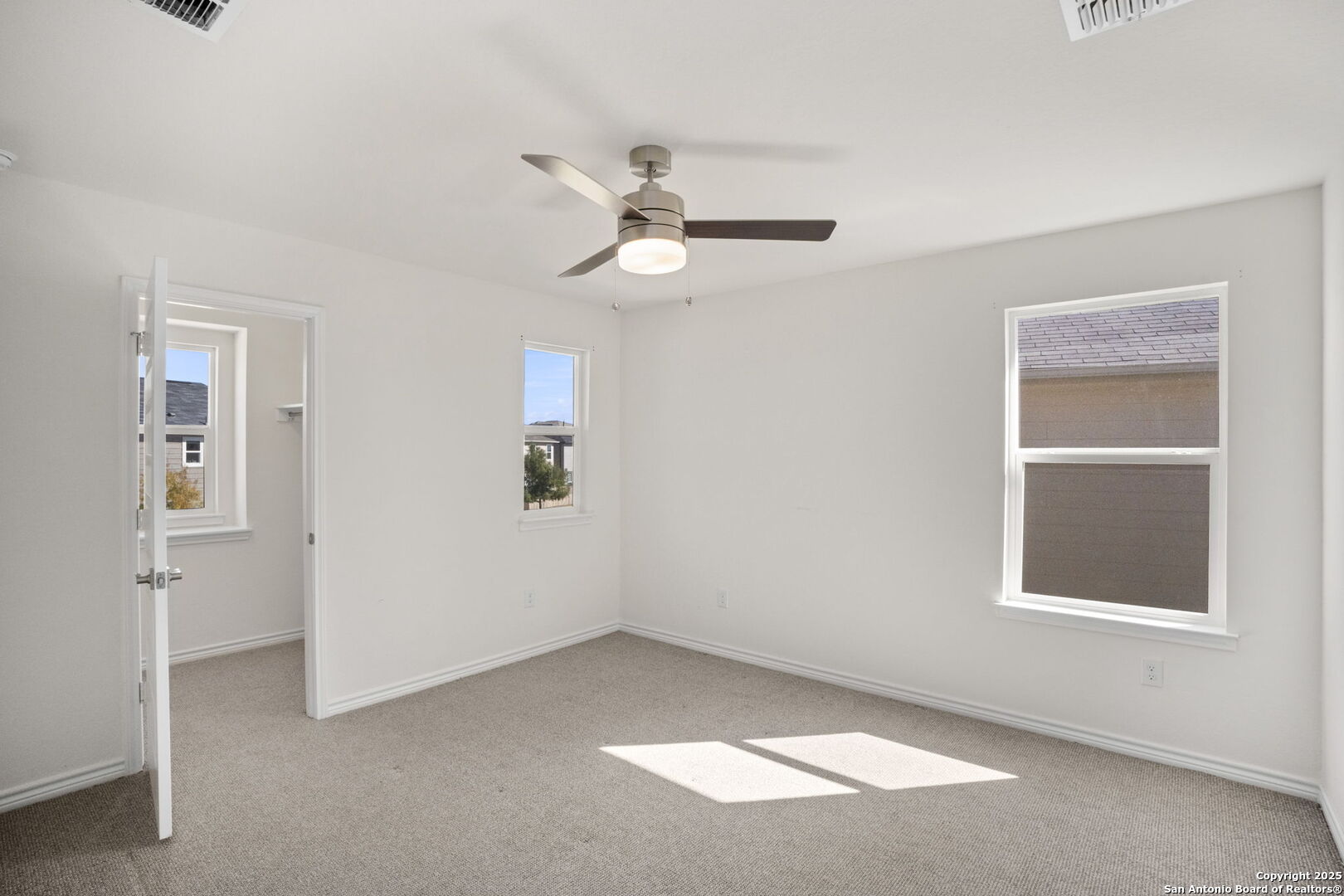 14839 Vance Jackson Road, Unit 508 San Antonio, TX 78249 - Photo 27 of 35 a view of an empty room with a window