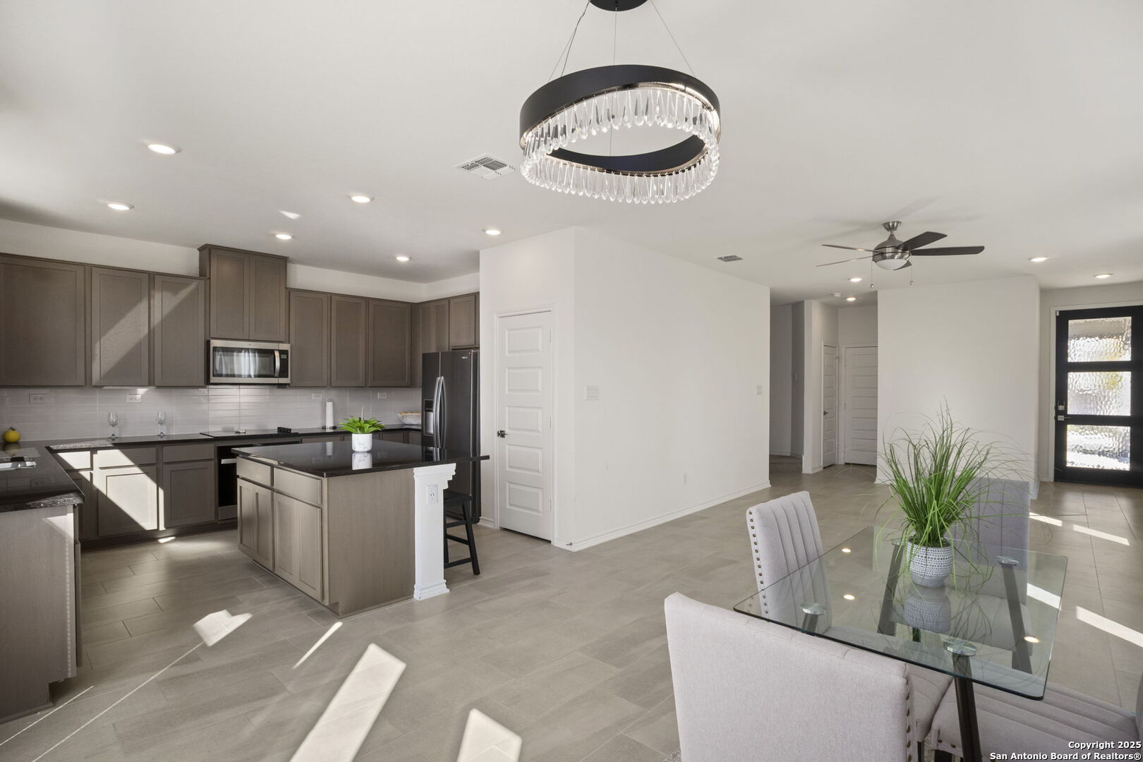 14839 Vance Jackson Road, Unit 508 San Antonio, TX 78249 - Photo 5 of 35 a kitchen with stainless steel appliances granite countertop sink stove and cabinets