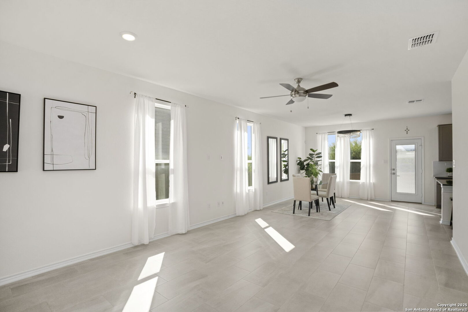 14839 Vance Jackson Road, Unit 508 San Antonio, TX 78249 - Photo 6 of 35 a view of a livingroom with furniture and a ceiling fan