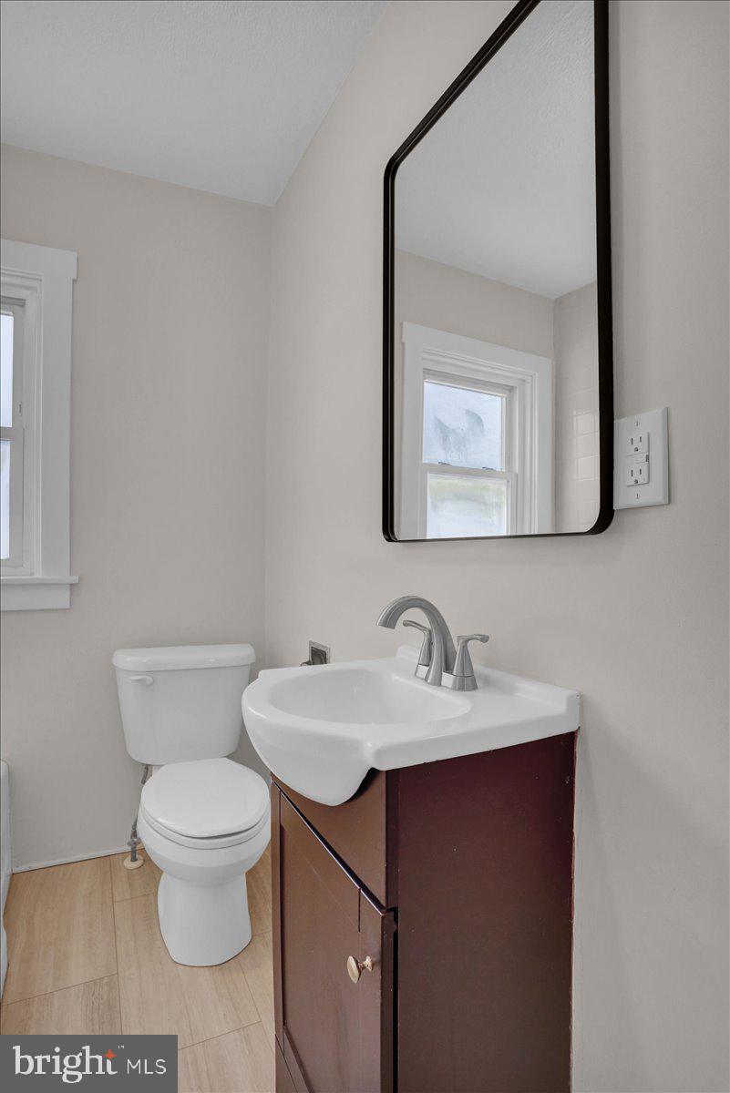 2715 Perkiomen Avenue Reading, PA 19606 - Photo 20 of 23 a bathroom with a toilet sink and mirror
