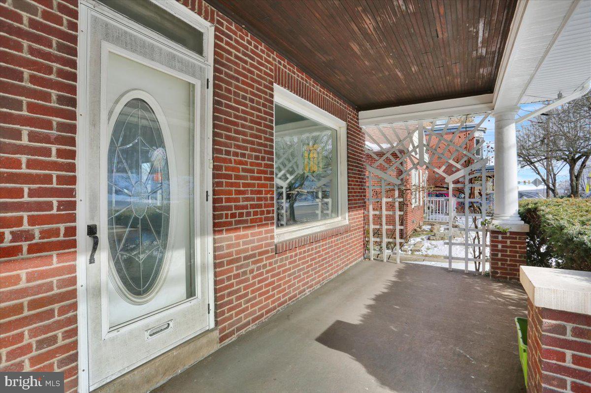2715 Perkiomen Avenue Reading, PA 19606 - Photo 2 of 23 a view of a livingroom with furniture and garden view