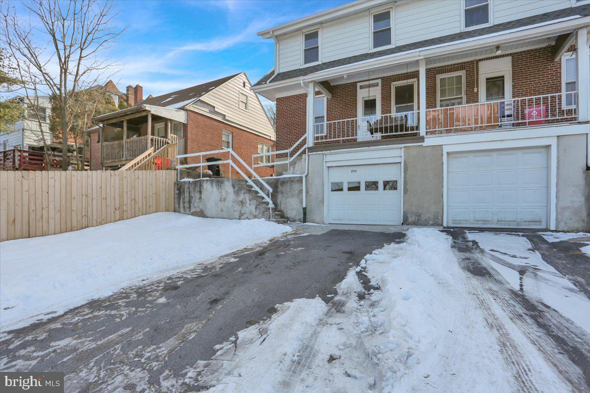 2715 Perkiomen Avenue Reading, PA 19606 - Photo 5 of 23 a front view of a house with a yard