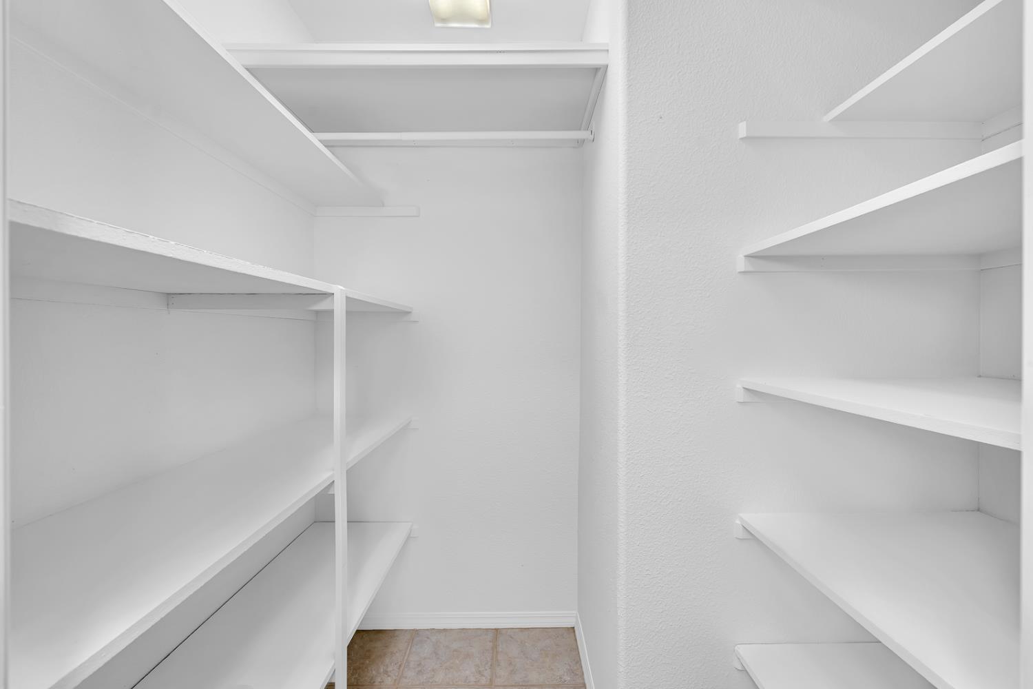 2352 Frederick Way Madera, CA 93637 - Photo 12 of 39 a view of an empty walk in closet