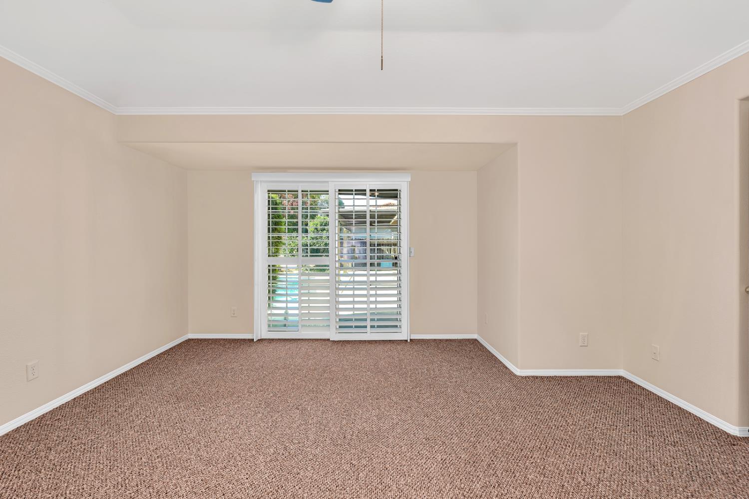 2352 Frederick Way Madera, CA 93637 - Photo 20 of 39 a view of an empty room with a window