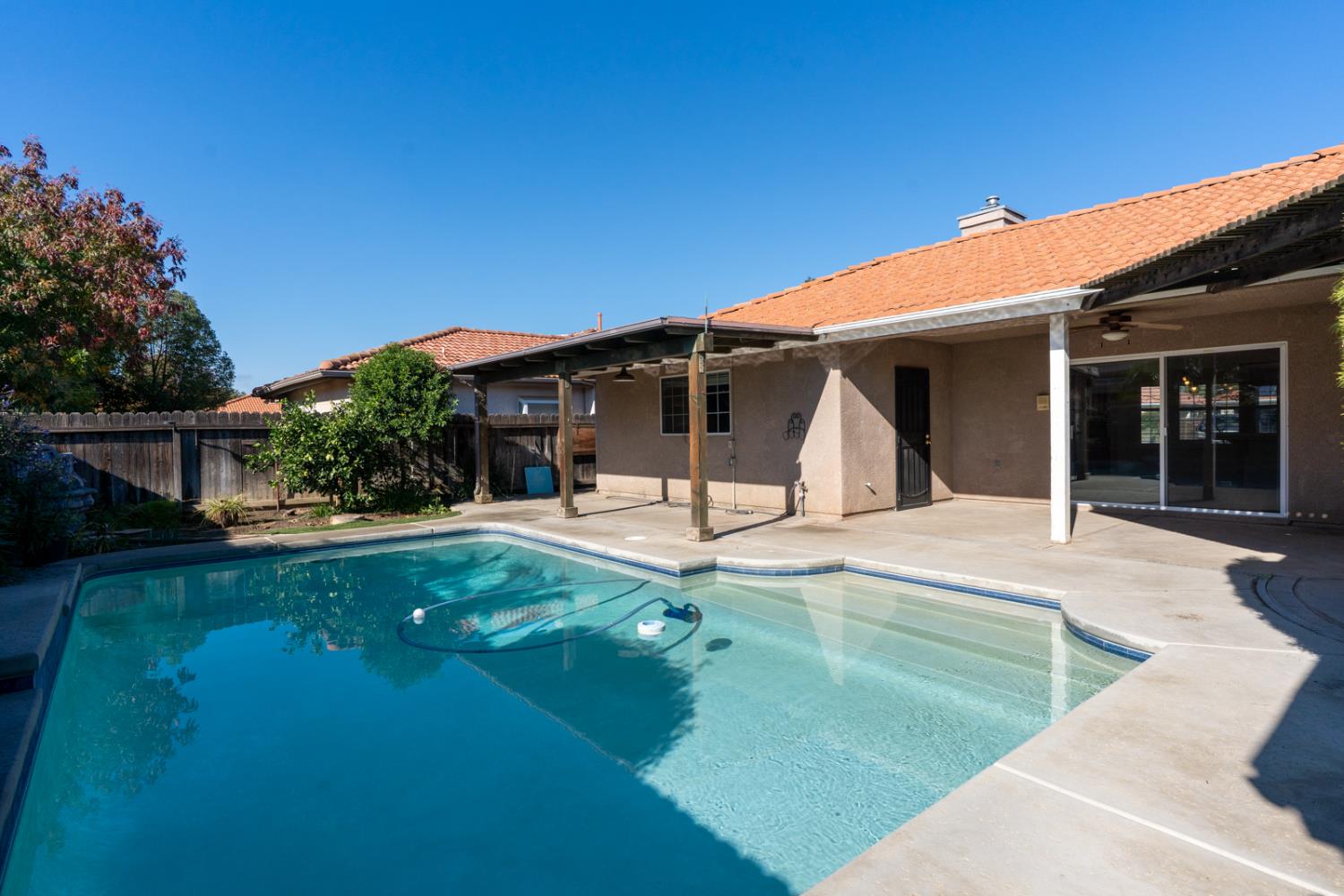 2352 Frederick Way Madera, CA 93637 - Photo 33 of 39 a view of a house with backyard porch and sitting area