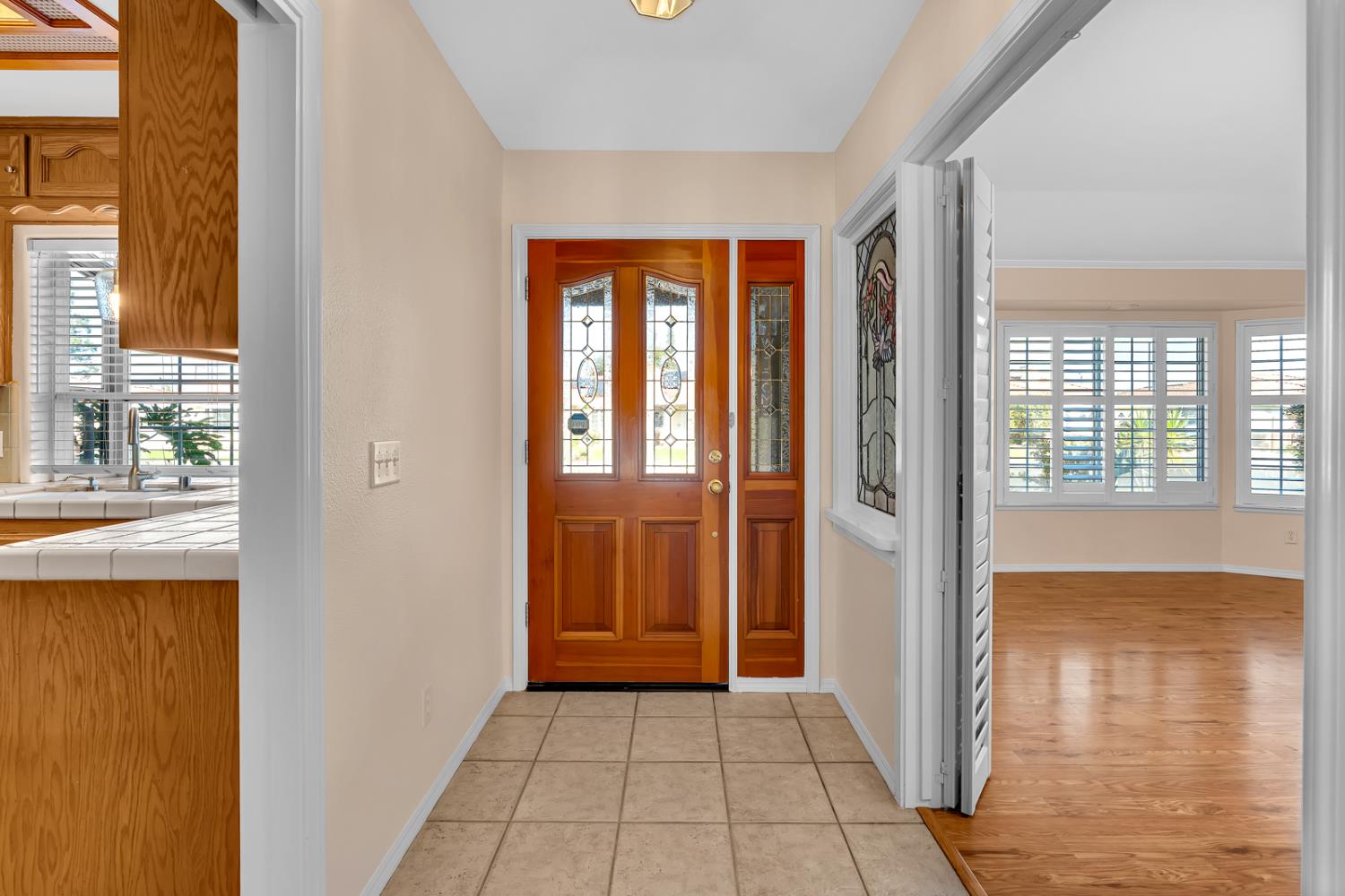 2352 Frederick Way Madera, CA 93637 - Photo 4 of 39 a view of an entryway with wooden floor