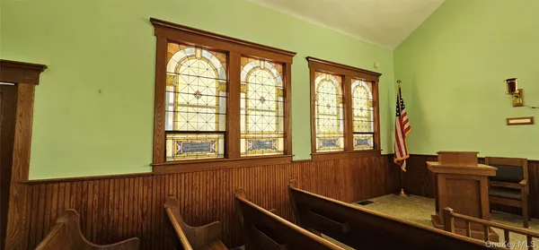 a view of a room with a large window