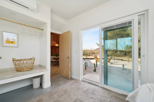 a view of livingroom with furniture and window