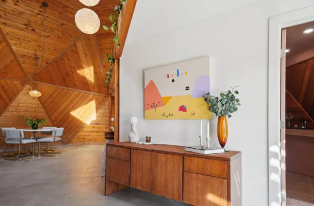 a room with furniture and garden view