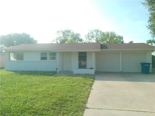 a view of a house with a garden