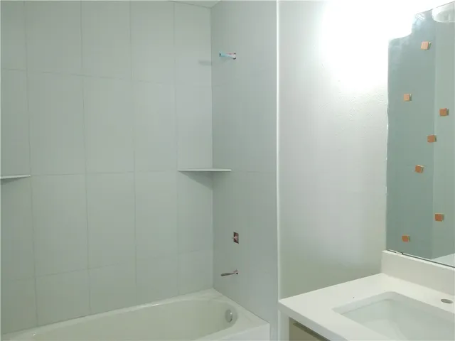 a bathroom with a bathtub