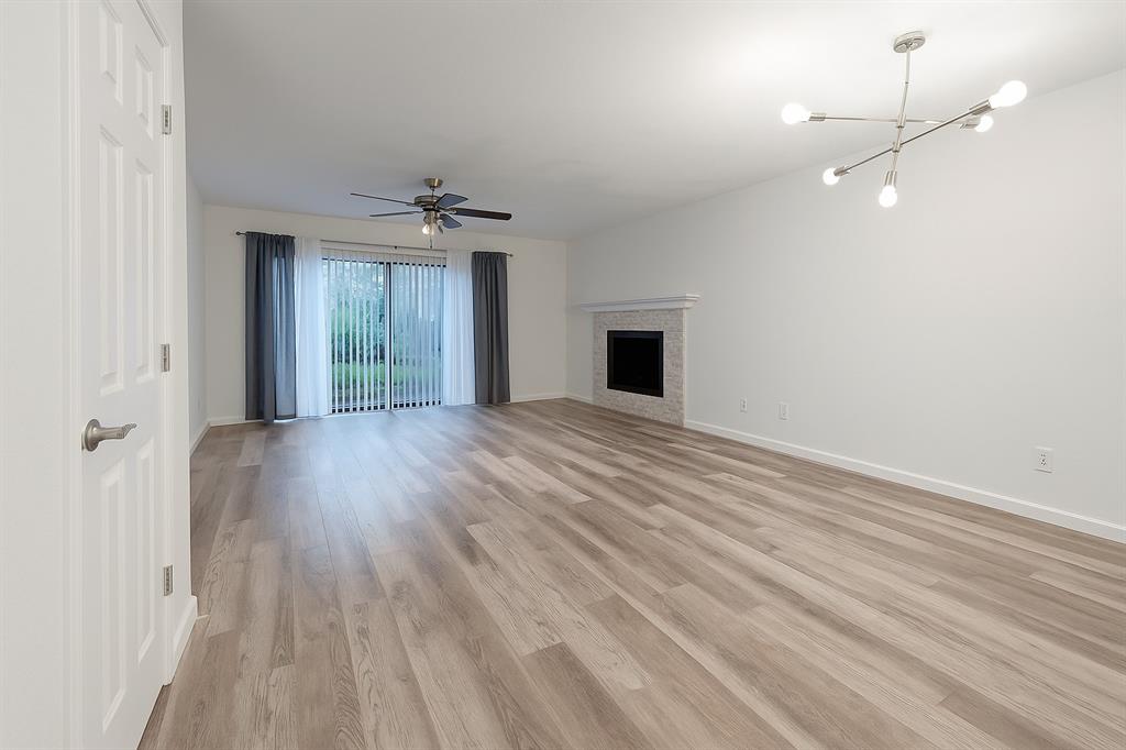 4561 O North O'Connor Road, Unit 1294 Irving, TX 75062 - Photo 2 of 31 wooden floor in an empty room with a window