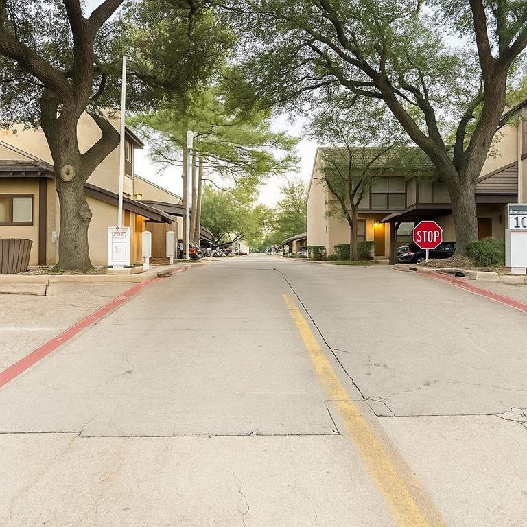 4561 O North O'Connor Road, Unit 1294 Irving, TX 75062 - Photo 27 of 31 a building with trees in front of it