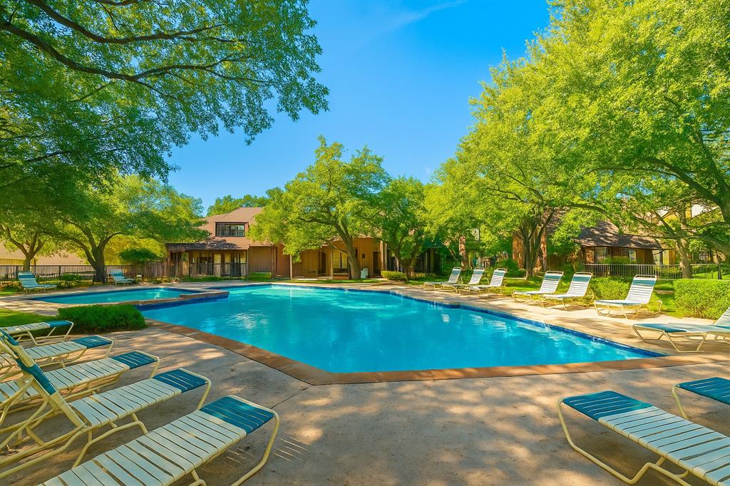 4561 O North O'Connor Road, Unit 1294 Irving, TX 75062 - Photo 30 of 31 a view of swimming pool with lawn chairs and plants