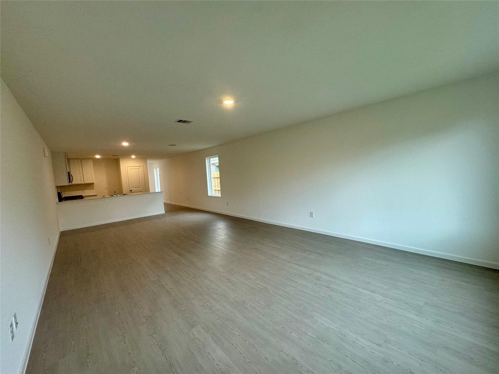 26710 Feather Reed Drive Katy, TX 77493 - Photo 7 of 10 an empty room with a empty space and window