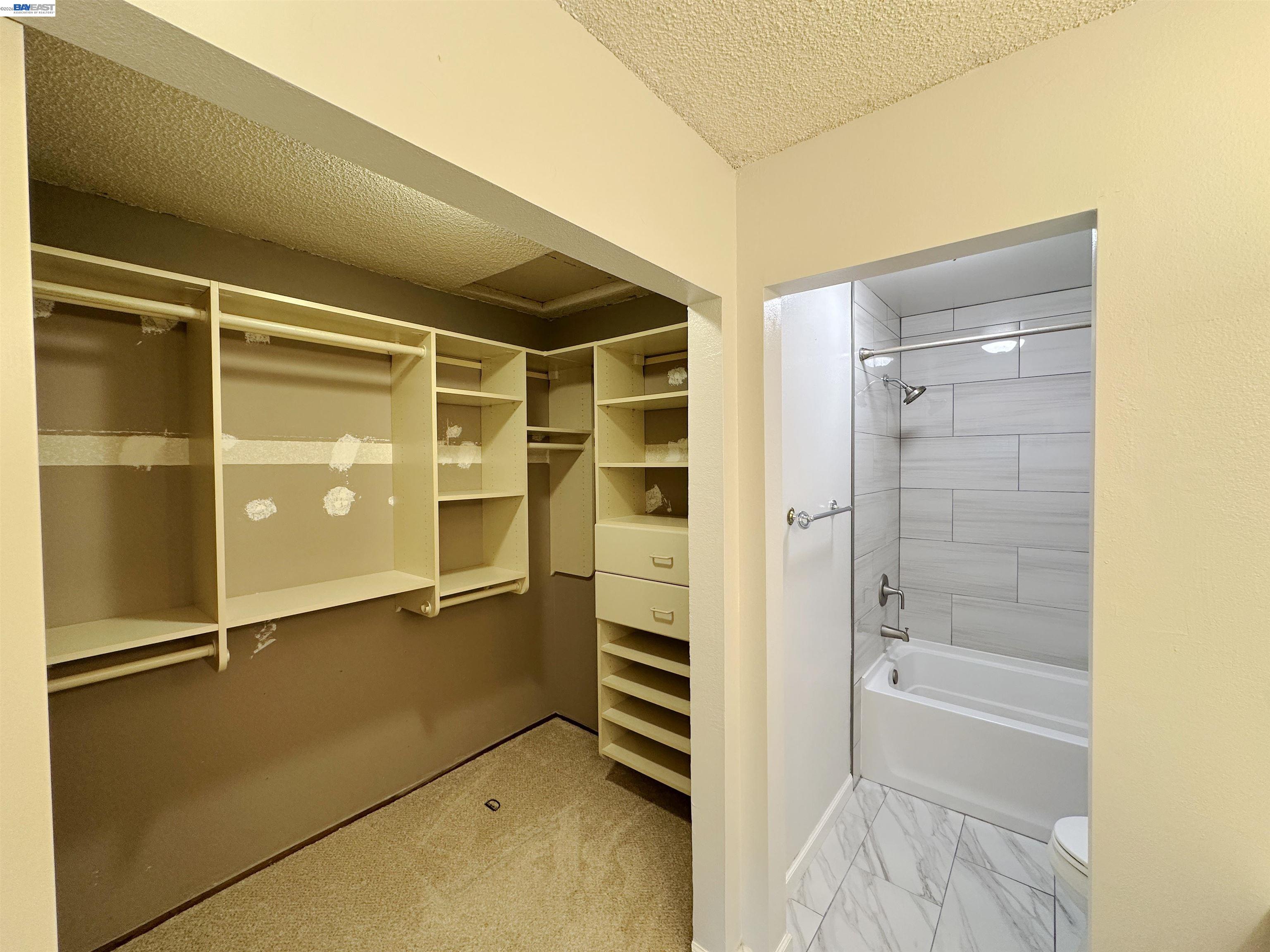 4565 Wildcat Lane Concord, CA 94521 - Photo 8 of 15 a bathroom with a shower and a tub