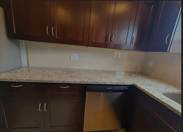 a bathroom with a sink and mirror