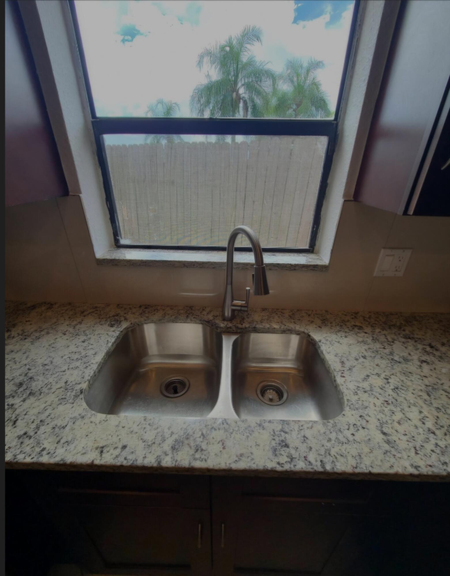 22761 Southwest 64th Way Boca Raton, FL 33428 - Photo 17 of 22 a bathroom with a sink and mirror