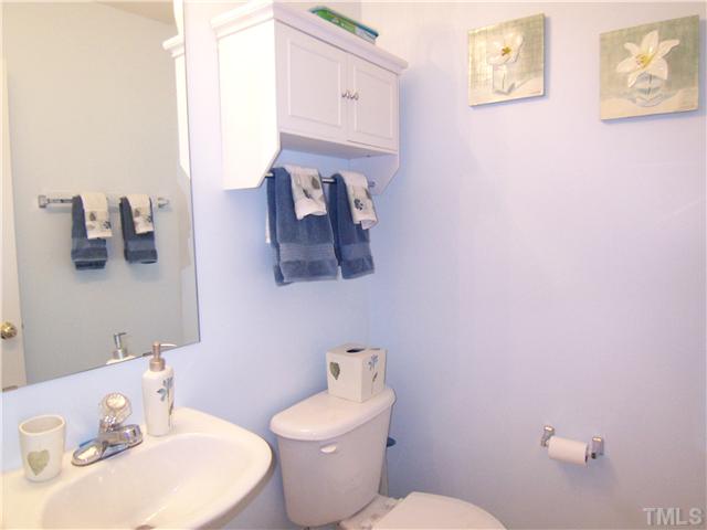 2115 Summer Shire Way Raleigh, NC 27604 - Photo 11 of 25 The 1st floor Half-Bath has a pedestal sink.