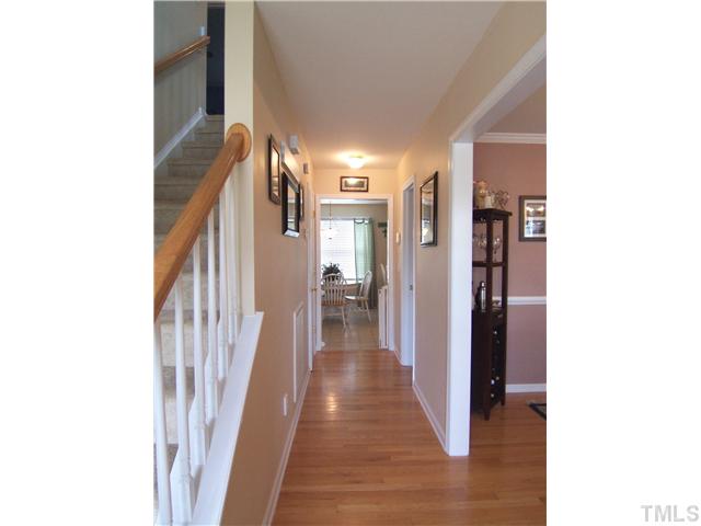 2115 Summer Shire Way Raleigh, NC 27604 - Photo 2 of 25 Hardwd-floored Foyer is open to the formal Dining Rm.