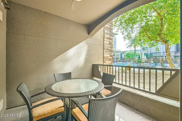 a outdoor dining space with furniture