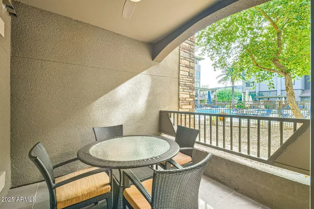 a outdoor dining space with furniture