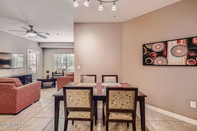 a view of a livingroom with furniture and window
