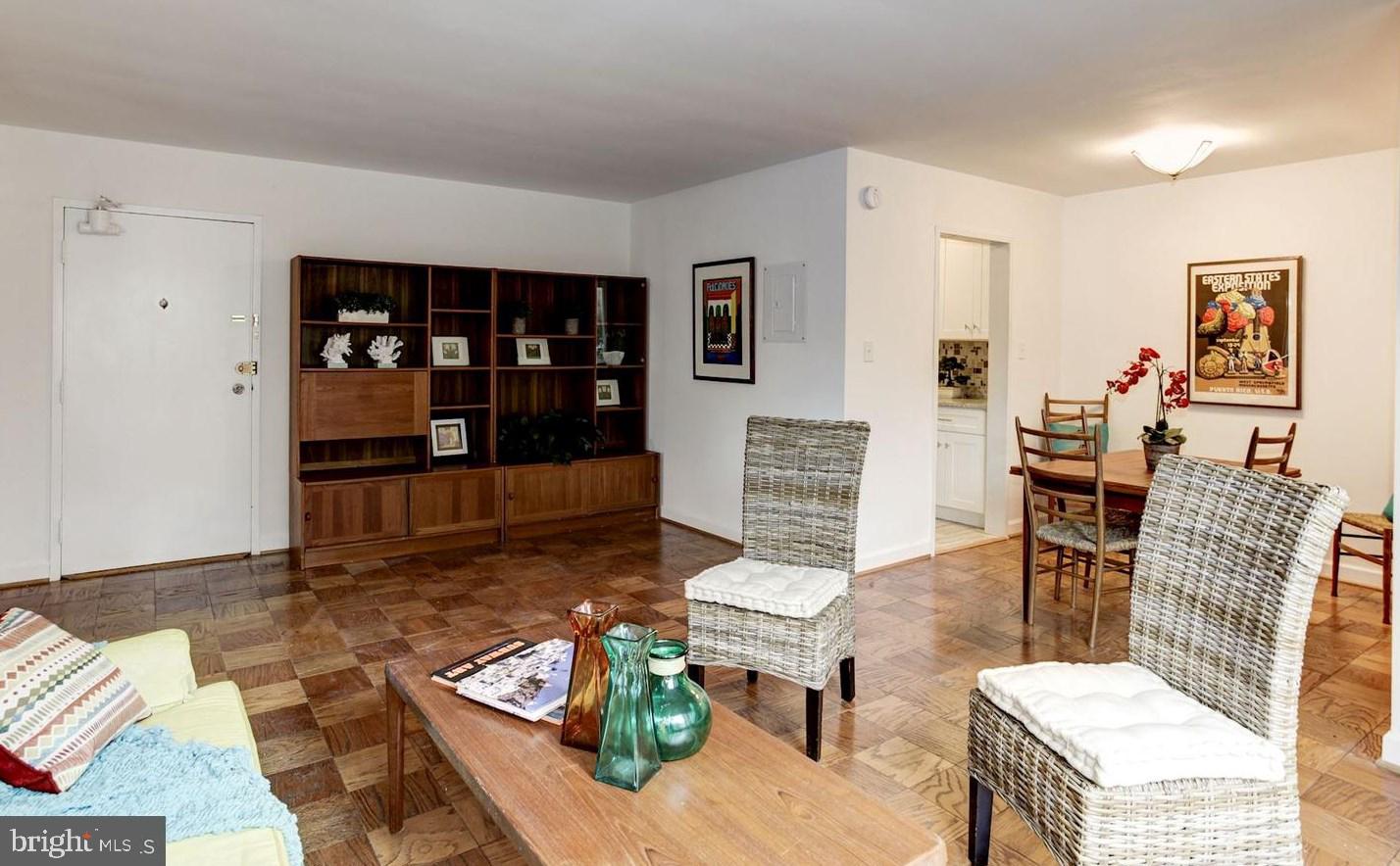 2400 41st Street Northwest, Unit 203 Washington, DC 20007 - Photo 10 of 24 a living room with furniture and window