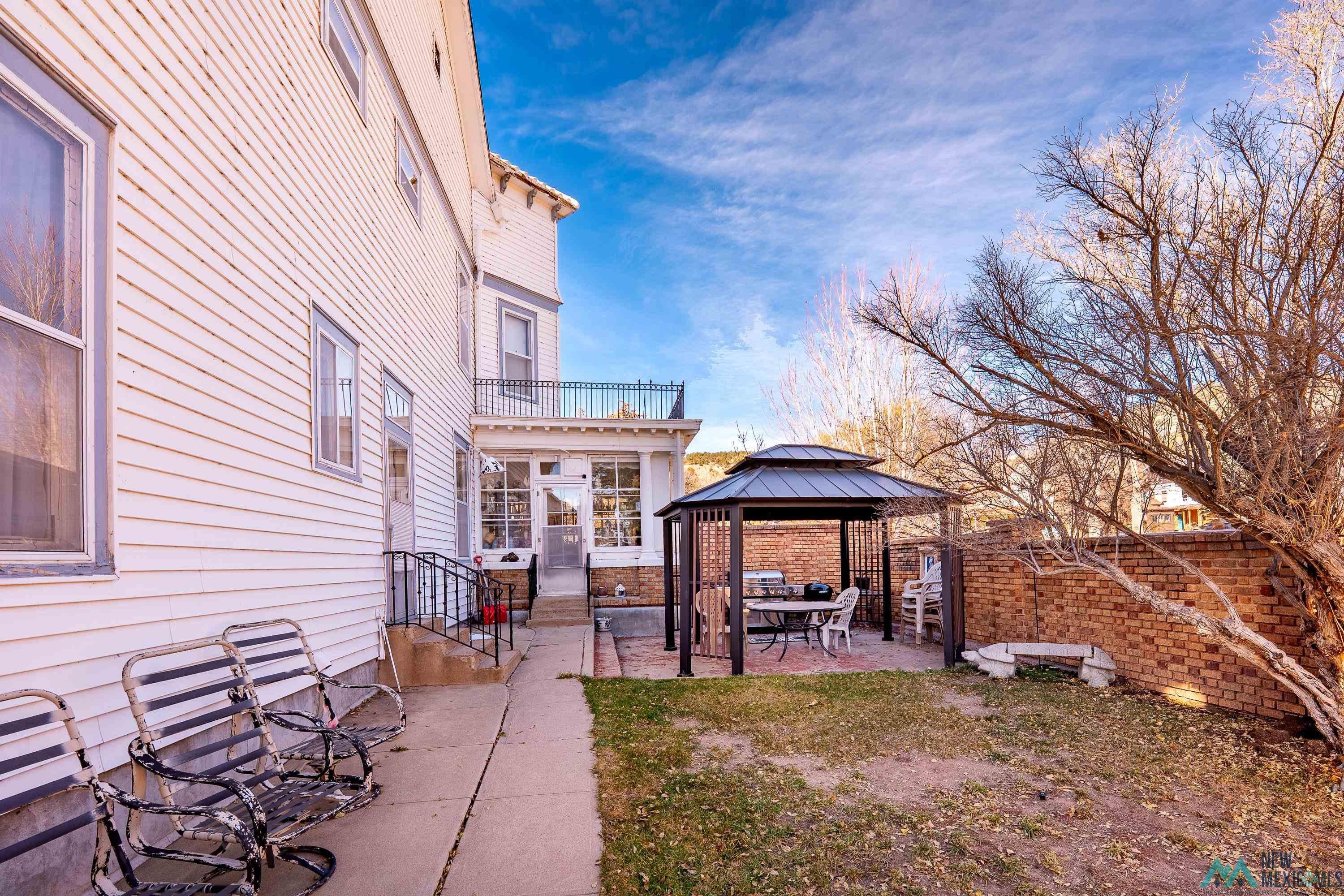 301 South 4th Street Raton, NM 87740 - Photo 46 of 78 View of yard with a patio and a gazebo
