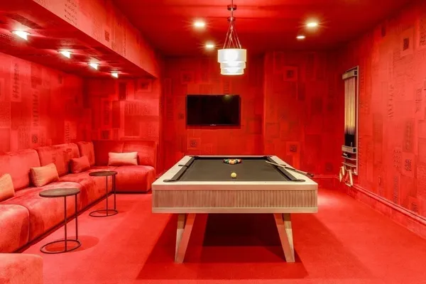 a room with furniture and a flat screen tv