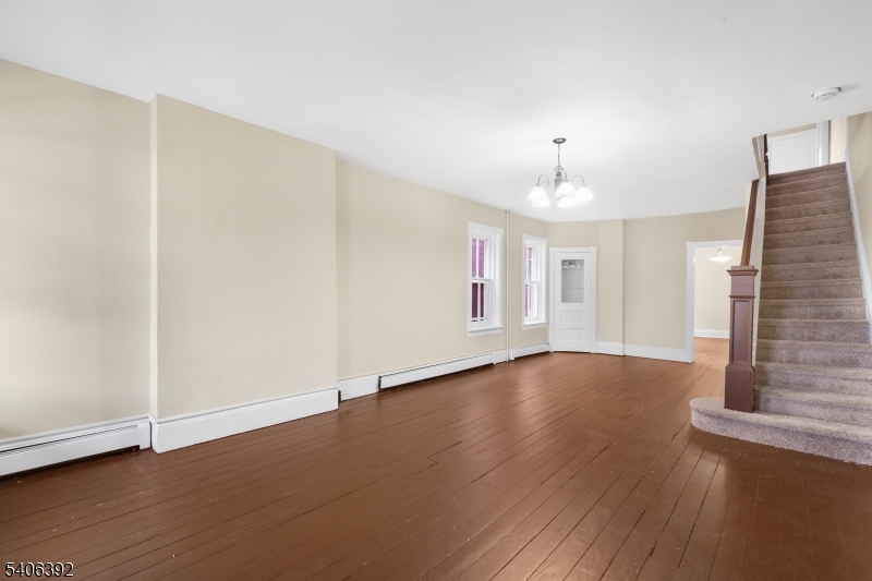 21 Short Street Trenton, NJ 08618 - Photo 4 of 22 a view of livingroom with hardwood floor and window