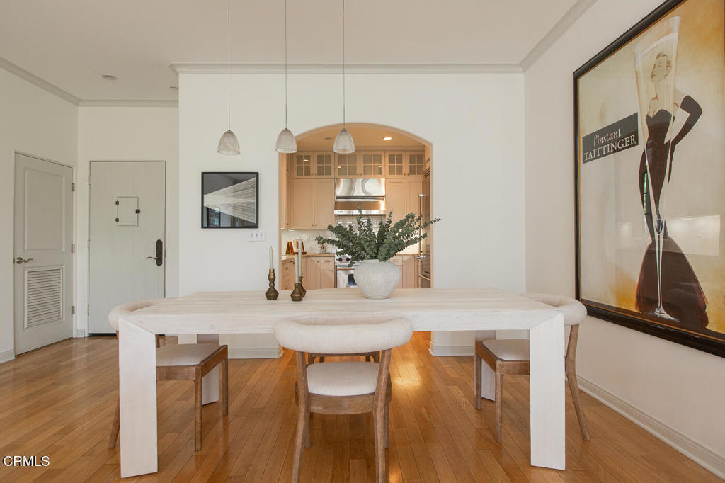 700 Union Street, Unit 302 Pasadena, CA 91101 - Photo 9 of 30 a view of a dining room with furniture and wooden floor