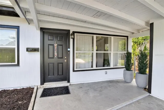 a view of entrance gate of a house