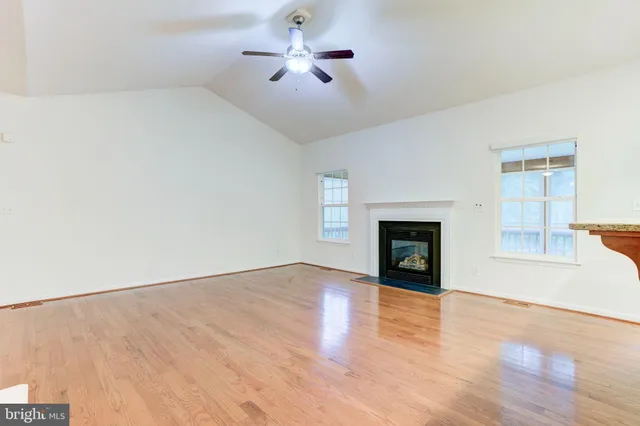 a bedroom with bed and a flat screen tv