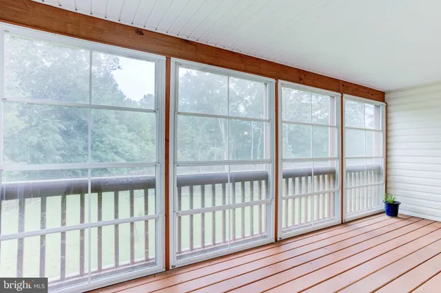 a bedroom with a bed and a lamp