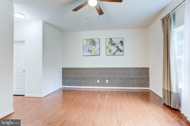 a bathroom with a granite countertop bathtub shower sink and mirror