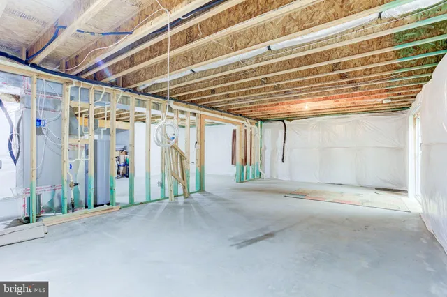 a view of a room with wooden walls