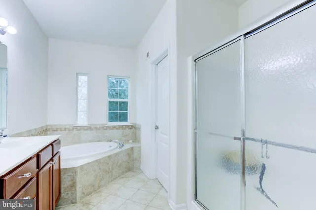 a front view of a house with a yard and porch