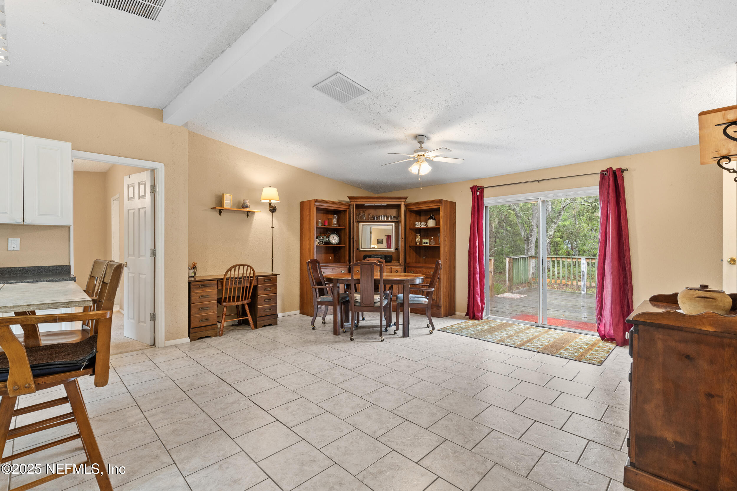 5671 Chugah Street Keystone Heights, FL 32656 - Photo 17 of 47 a bedroom with furniture and a large window