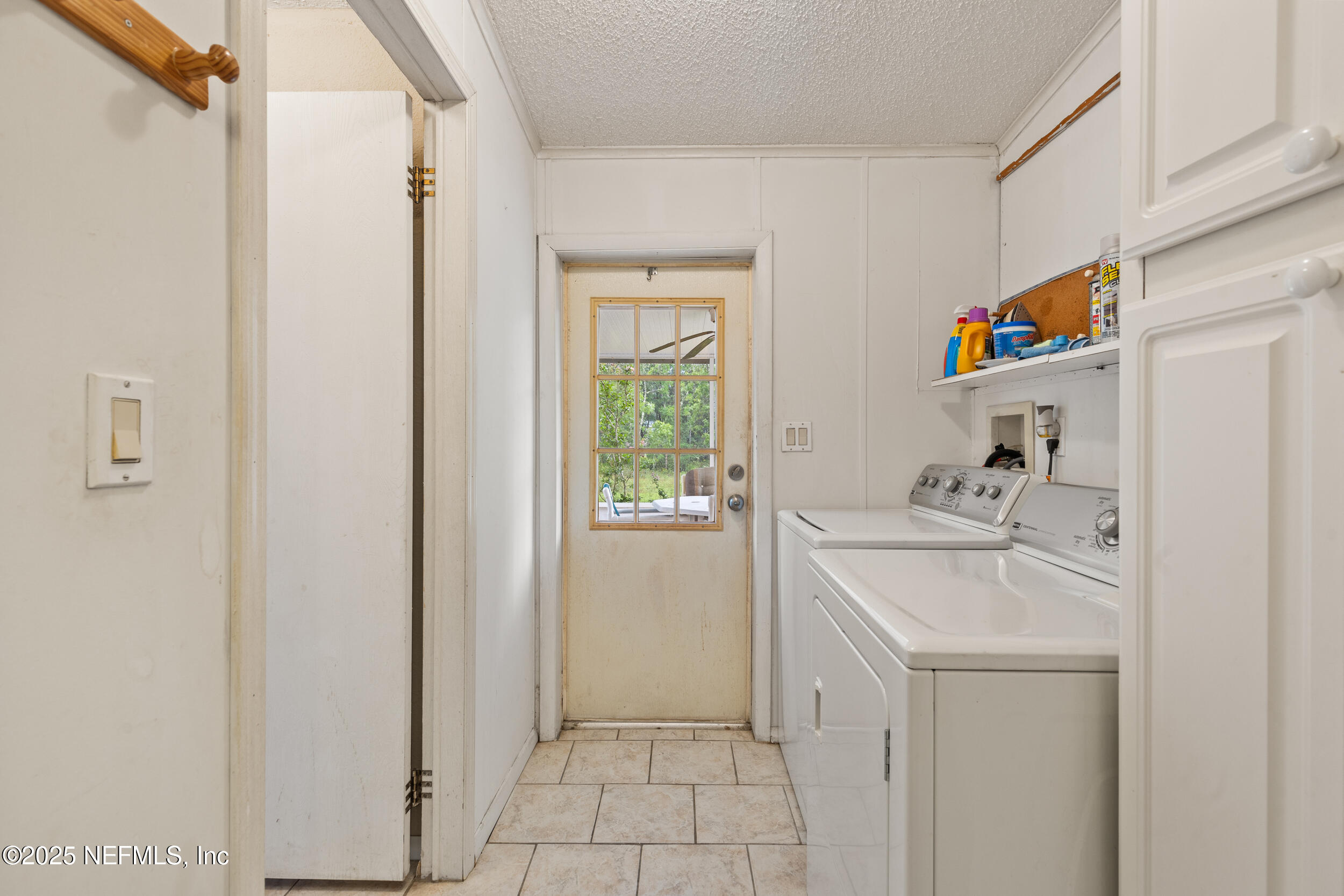 5671 Chugah Street Keystone Heights, FL 32656 - Photo 33 of 47 a utility room with sink dryer and washer