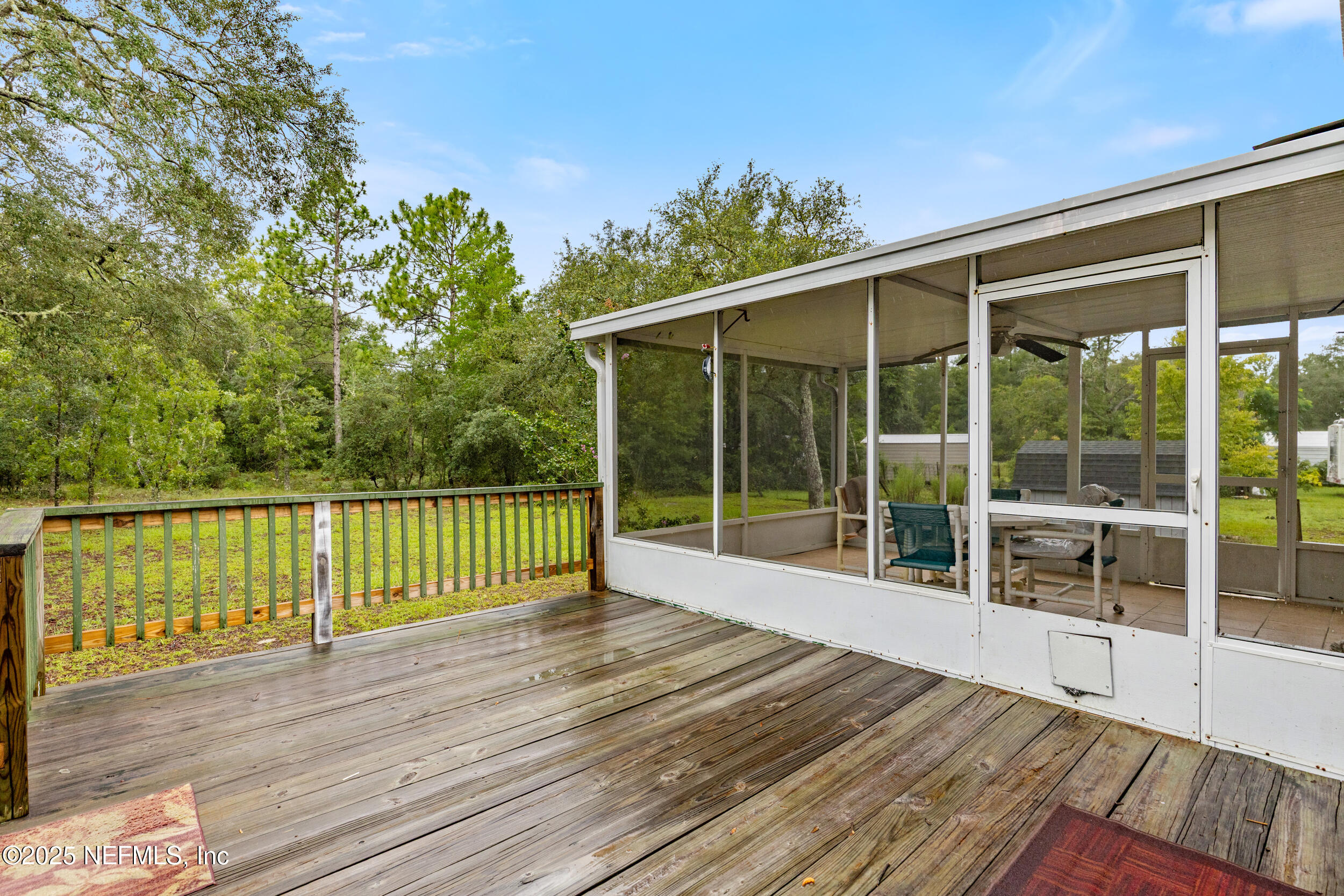 5671 Chugah Street Keystone Heights, FL 32656 - Photo 37 of 47 a view of outdoor space with deck and backyard