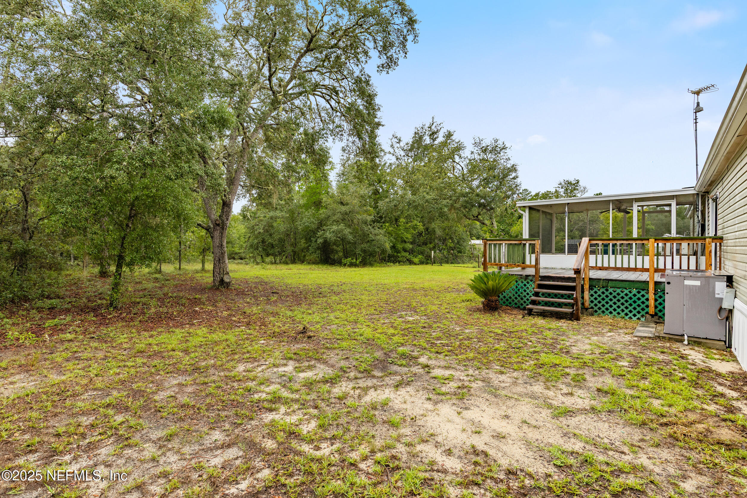 5671 Chugah Street Keystone Heights, FL 32656 - Photo 38 of 47 a view of a house with a yard
