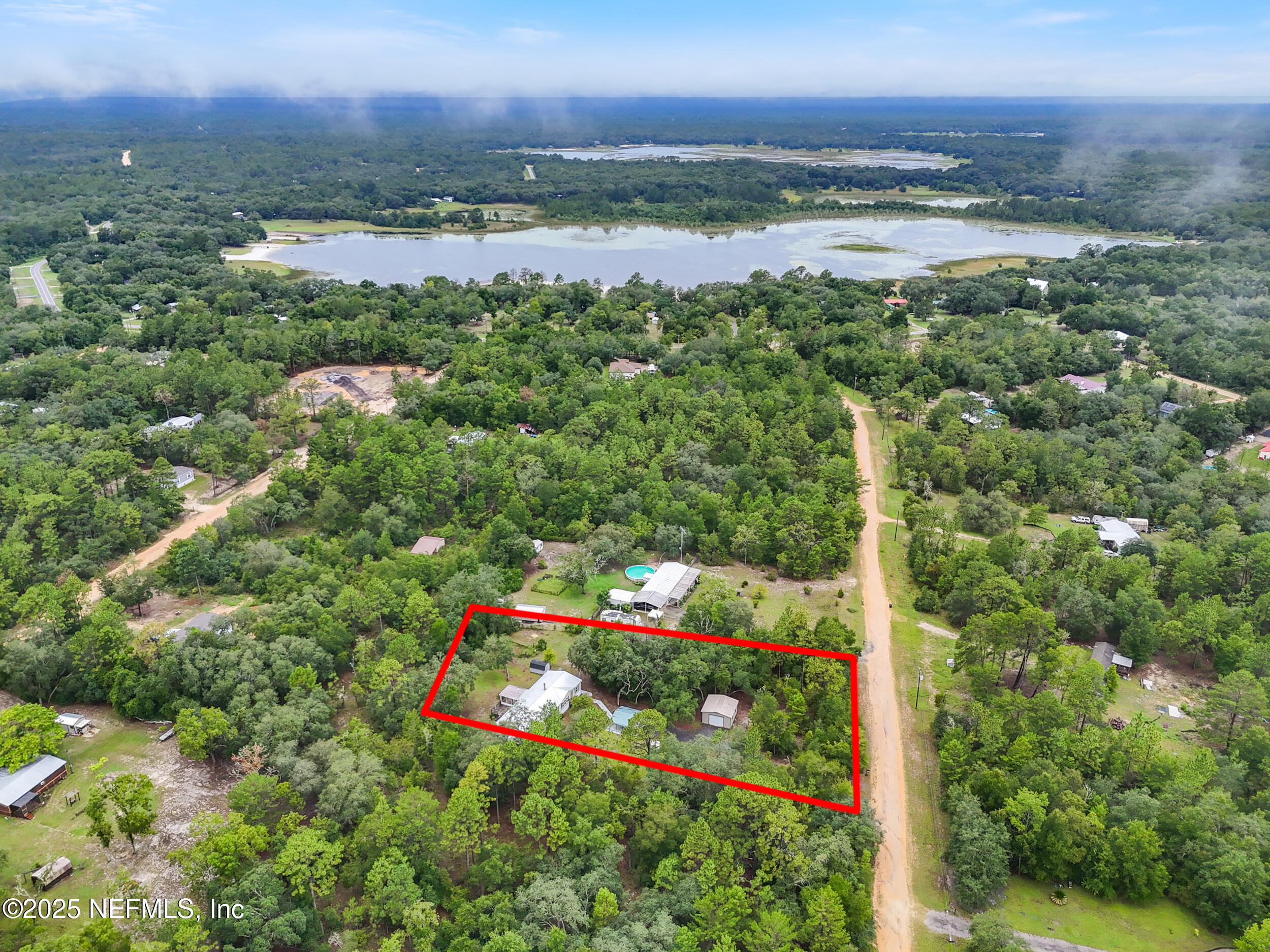 5671 Chugah Street Keystone Heights, FL 32656 - Photo 46 of 47 a view of lake with outdoor space