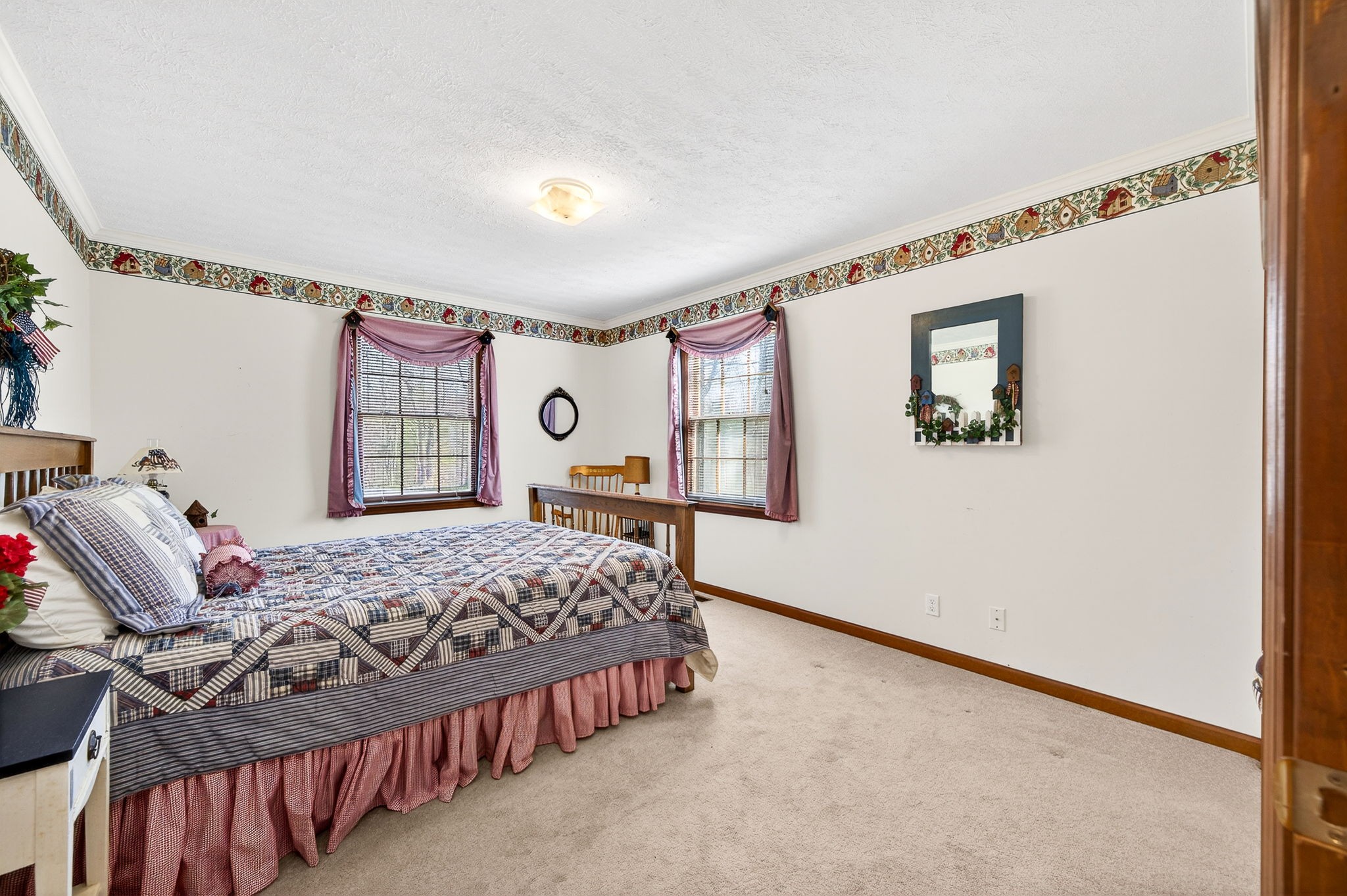 676 Sunny Point Road Baxter, TN 38544 - Photo 13 of 35 a bedroom with a bed and a window
