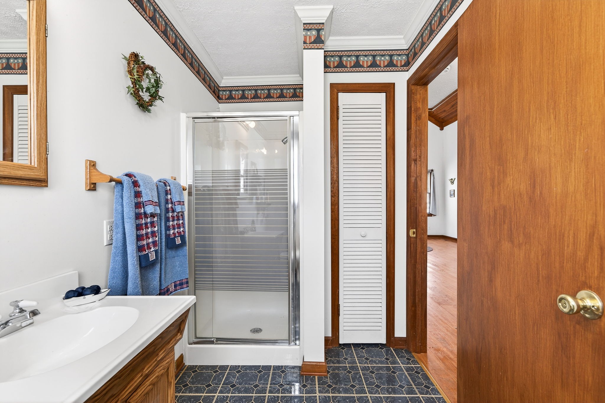 676 Sunny Point Road Baxter, TN 38544 - Photo 16 of 35 a bathroom with a sink and a shower