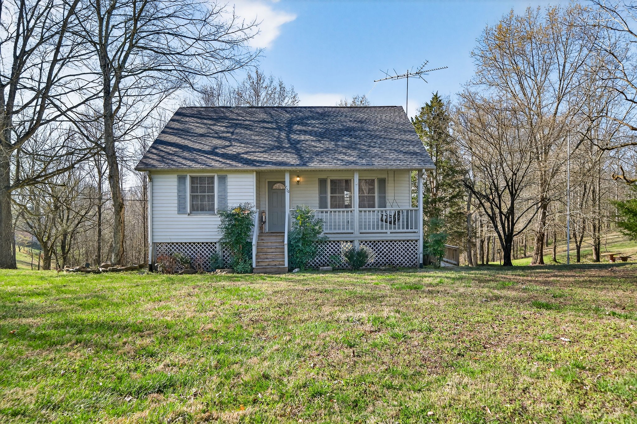 676 Sunny Point Road Baxter, TN 38544 - Photo 2 of 35 a house view with a garden space